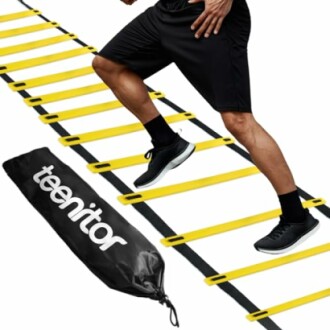 Person using a yellow agility ladder for exercise with a carrying bag labeled 'teenitor'.