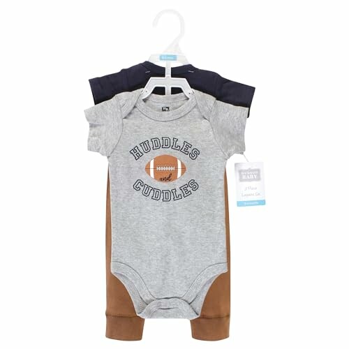 Set of baby onesies with football design, labeled 'Huddles and Cuddles'.