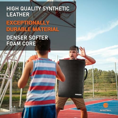 Coach with a pad and player on a basketball court discussing synthetic leather and foam core.