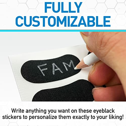 Hand writing on customizable eyeblack stickers with pencil.
