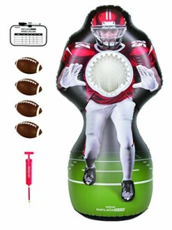 Inflatable football target game with player, footballs, pump, and scoreboard.