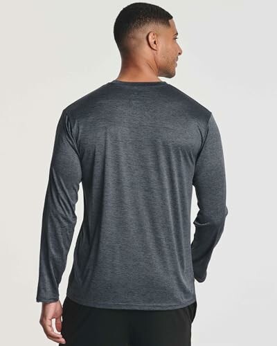 Man in a gray long sleeve shirt facing away