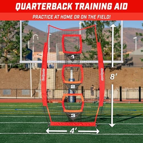 Quarterback training net with numbered targets on a football field.