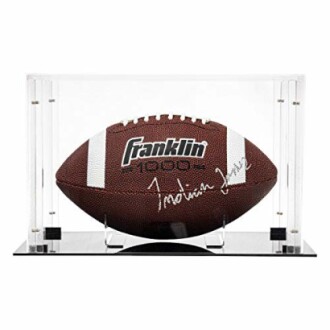 Signed football in a clear display case.