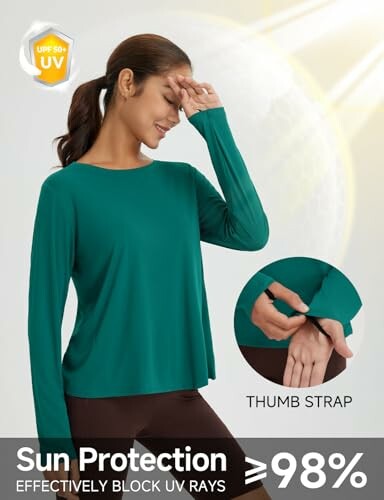 Woman wearing sun protection shirt with thumb strap.